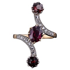 Antique French Garnet and Diamond Bypass Ring of 18k Gold