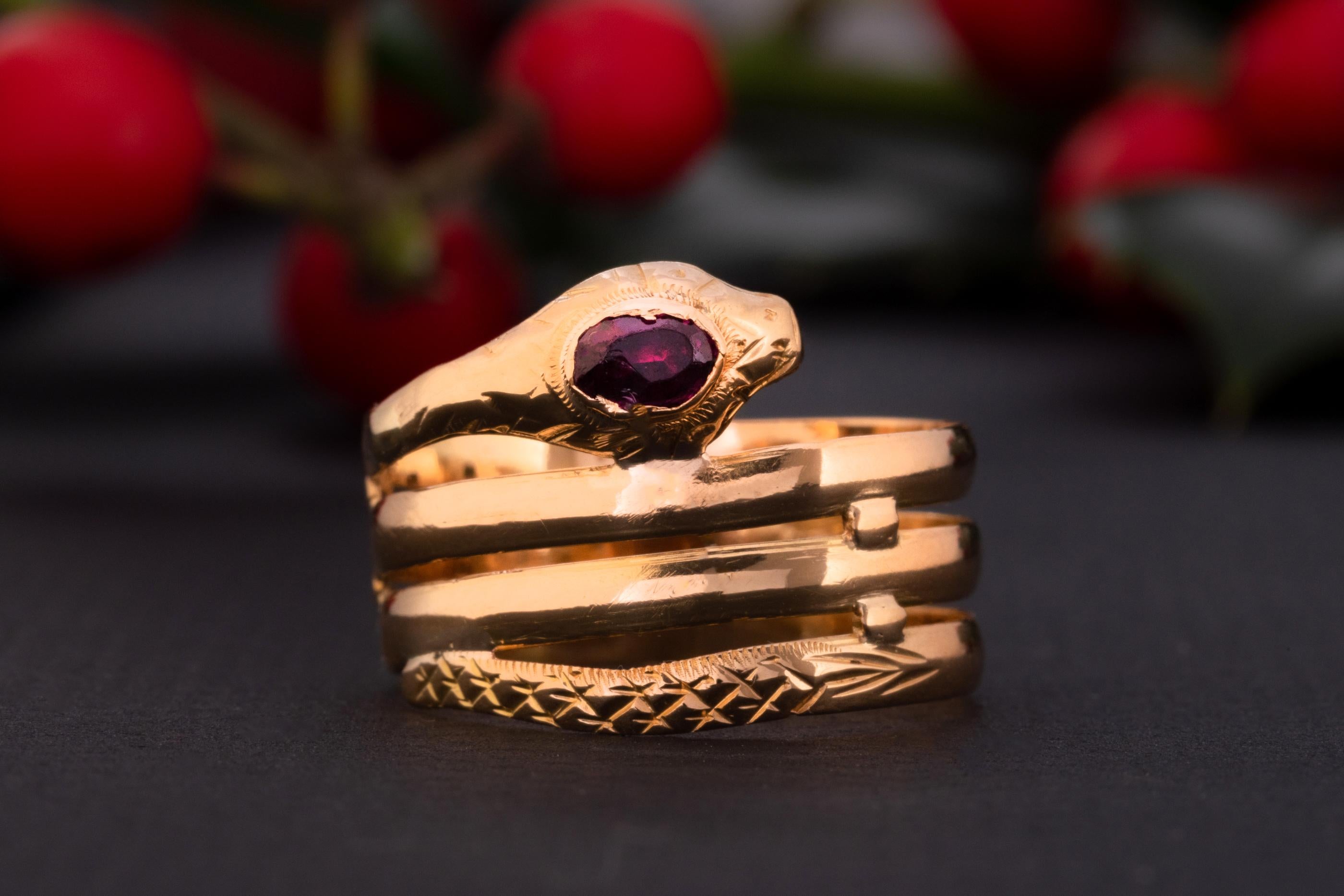Not one of those subtle snaky rings - this charming cobra is almost whooping 4 grams of solid high carat gold beauty - definitely for someone full of character! 

Unique detailing of the serpents' head coupled with a long body wrapping around your