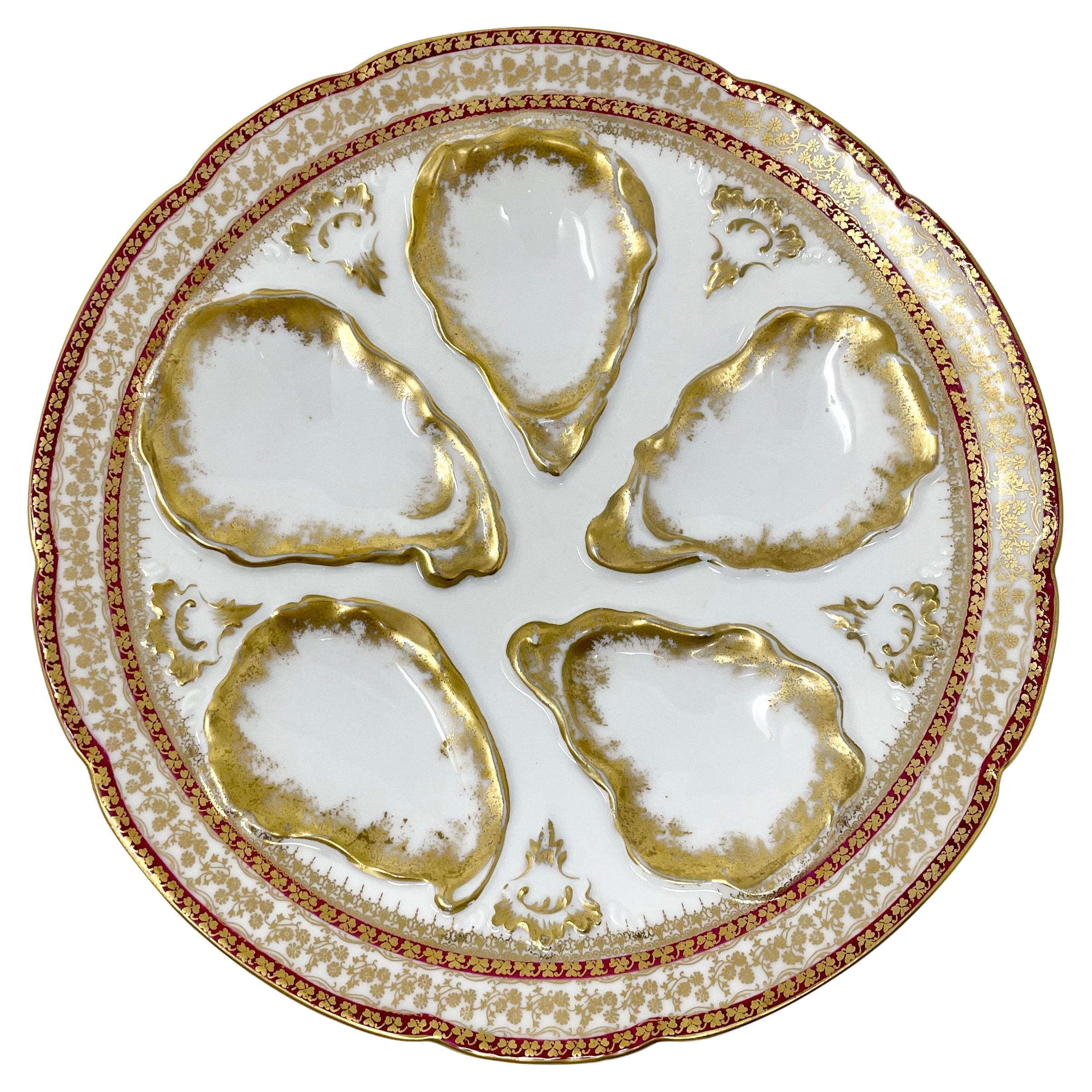 Antique French "G.D.A. Limoges" Porcelain Gold 
Red Oyster Plate, Circa 1900
s