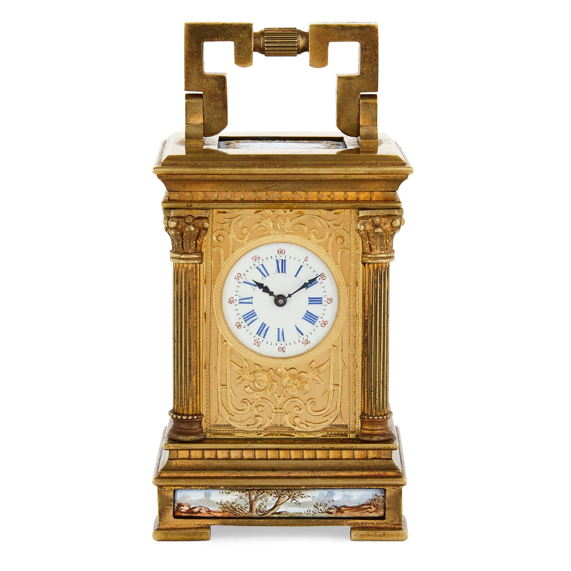 Antique French gilt bronze and enamel miniature carriage clock
French, late 19th Century
Clock: Height 11cm, width 5.5cm, depth 5cm
Case: Height 11cm, width 7cm, depth 7cm

This small and elegant gilt bronze carriage clock is crafted in the