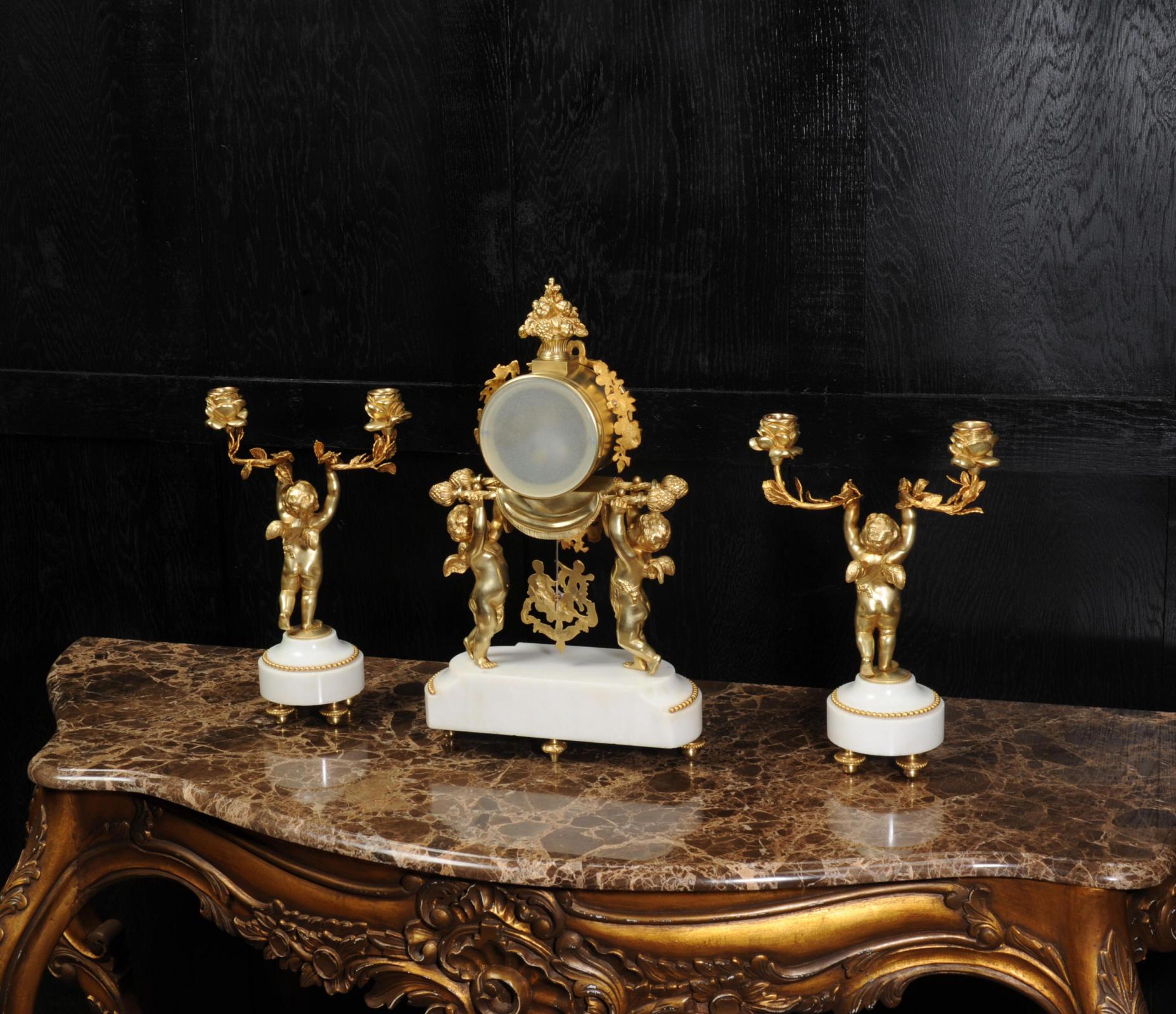 Antique French Gilt Bronze and Marble Cherub Clock Set with Visible Pendulum 7