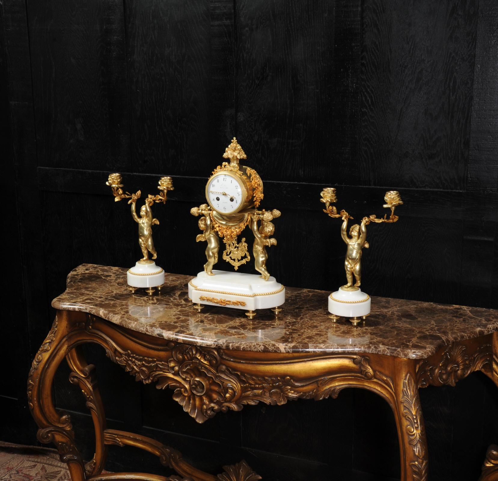 Louis XVI Antique French Gilt Bronze and Marble Cherub Clock Set with Visible Pendulum