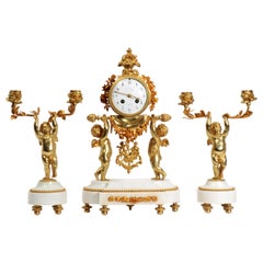 Antique French Gilt Bronze and Marble Cherub Clock Set with Visible Pendulum