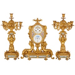 Antique French Gilt Bronze and Sèvres Style Porcelain Clock Set