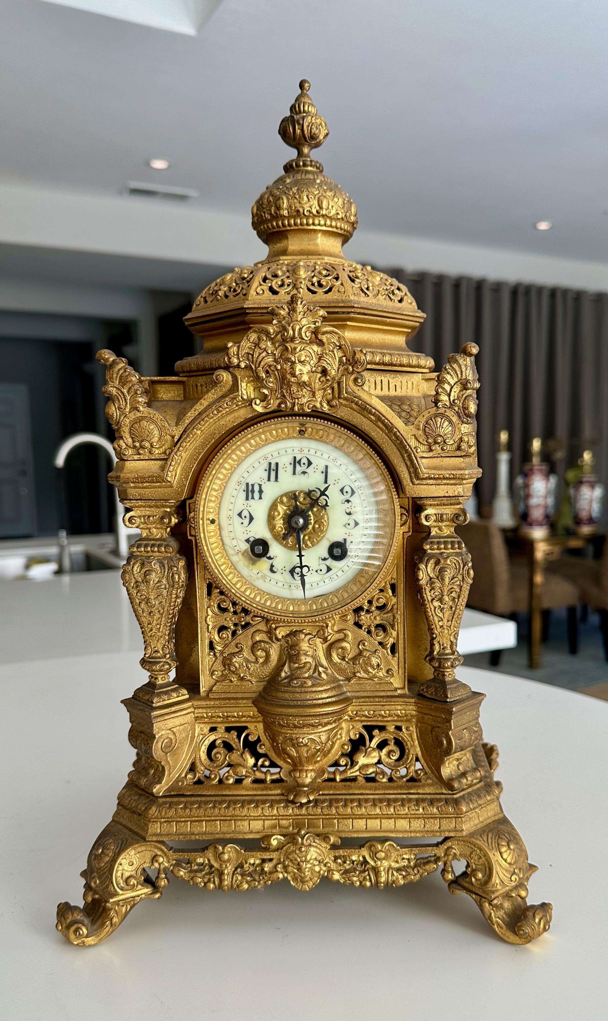 An original antique 19th C French Renaissance revival cathedral architectural theme mantle clock in solid gilt ormolu bronze (or brass) by S. Marti (stamped H & F Paris). 
Clock mechanism not functional needs servicing by professional clock