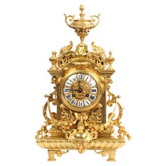 Antike französische Barockuhr aus vergoldeter Bronze