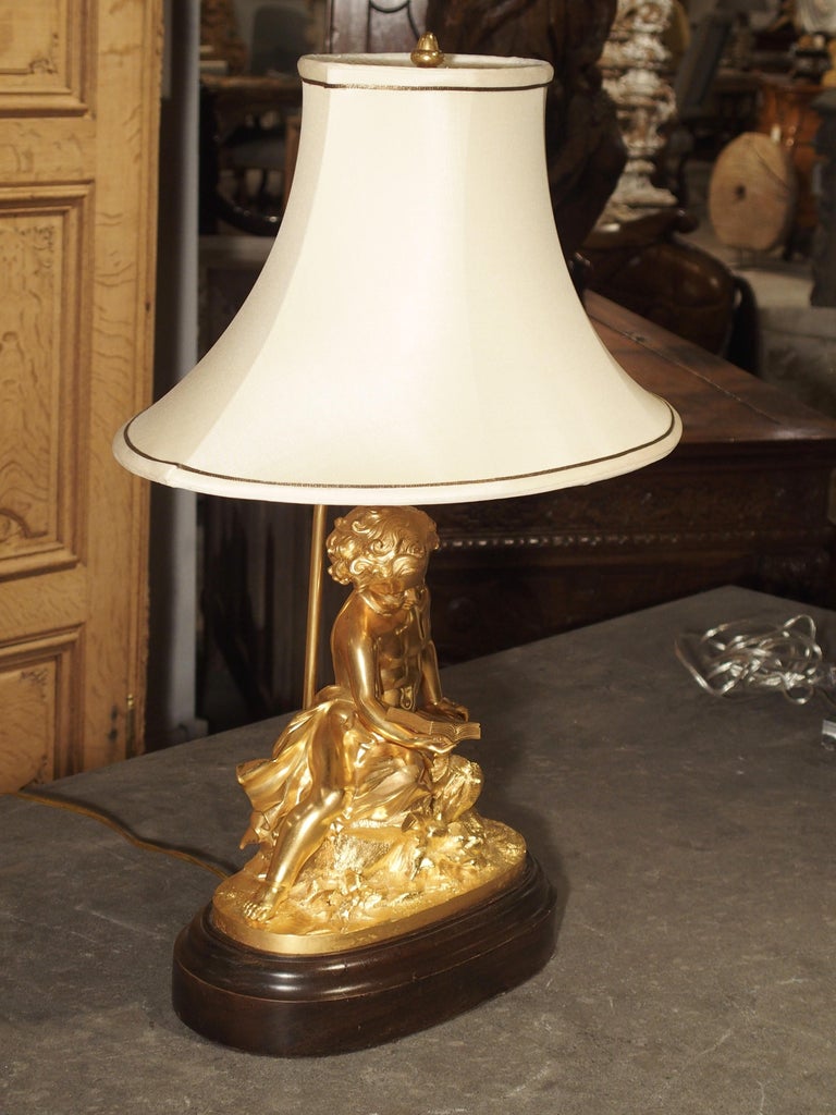 Antique French Gilt Bronze Cherub Lamp on Wooden Base For Sale 1