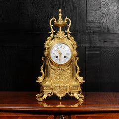 Horloge française ancienne en bronze doré représentant des dauphins par Achille Brocot
