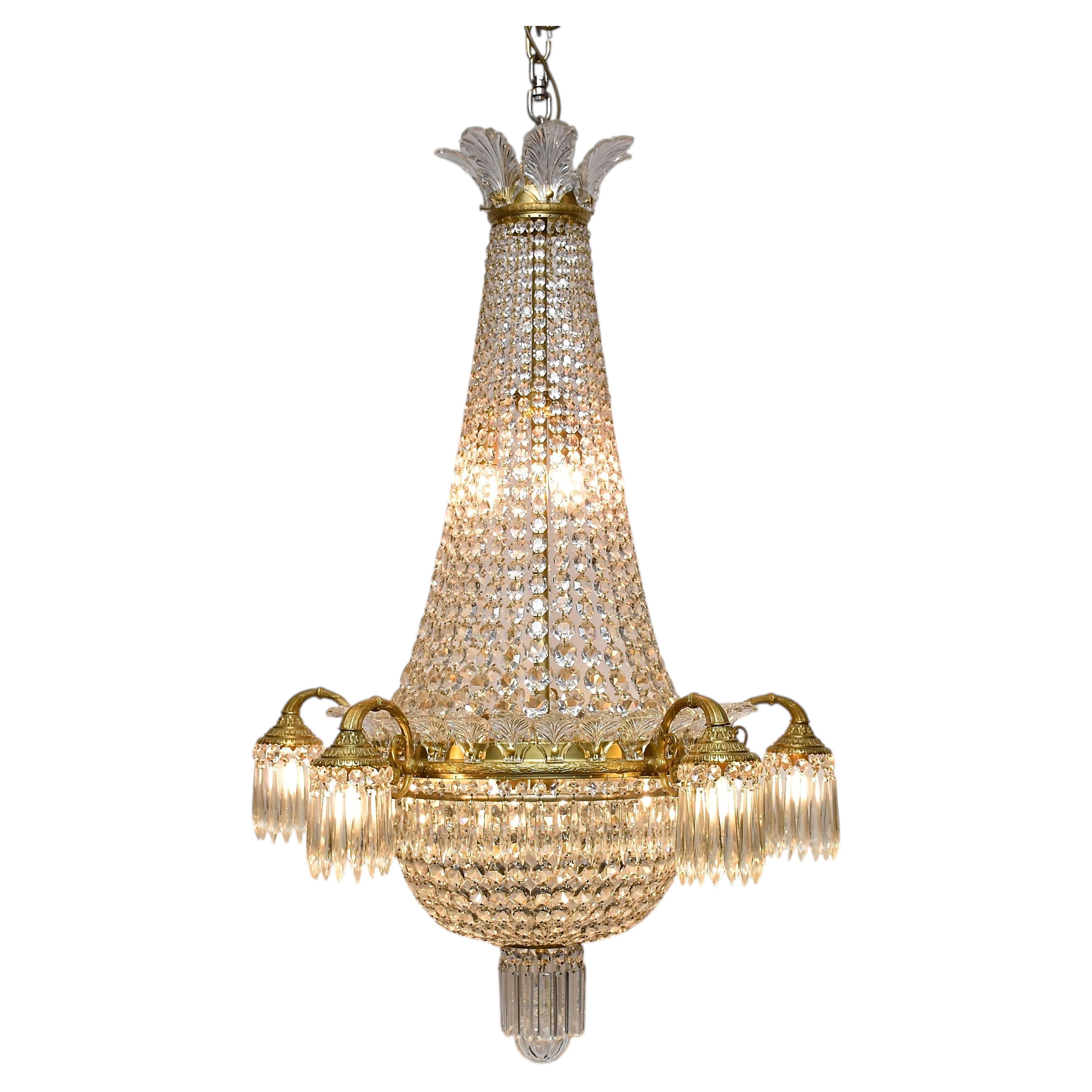 Antique French gilt bronze crystal chandelier in the style of Louis XVI, vers 1910