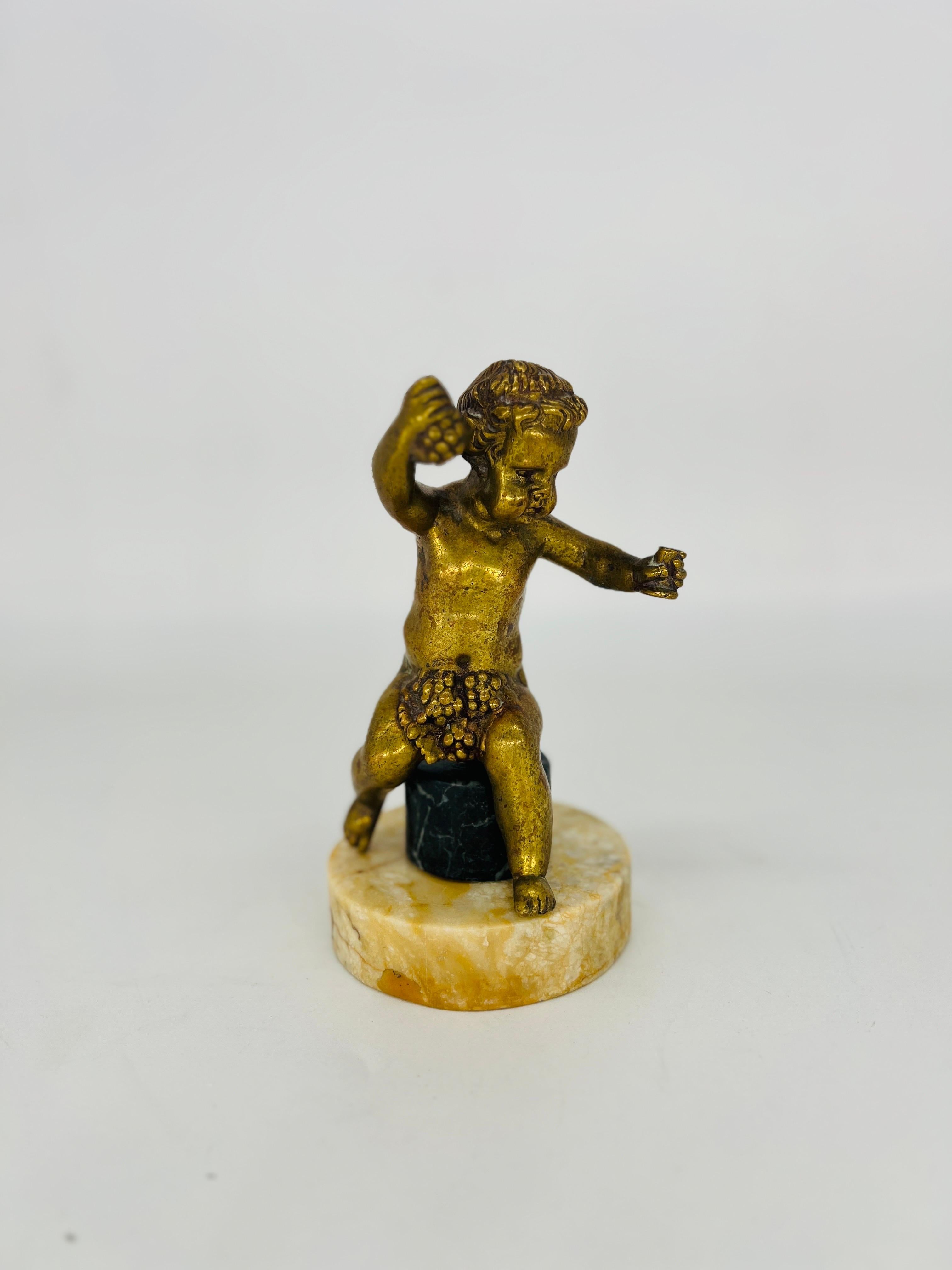Renaissance Revival Antique French Gilt Bronze “Grapes into Wine” Cherub Statue Falconet Style For Sale