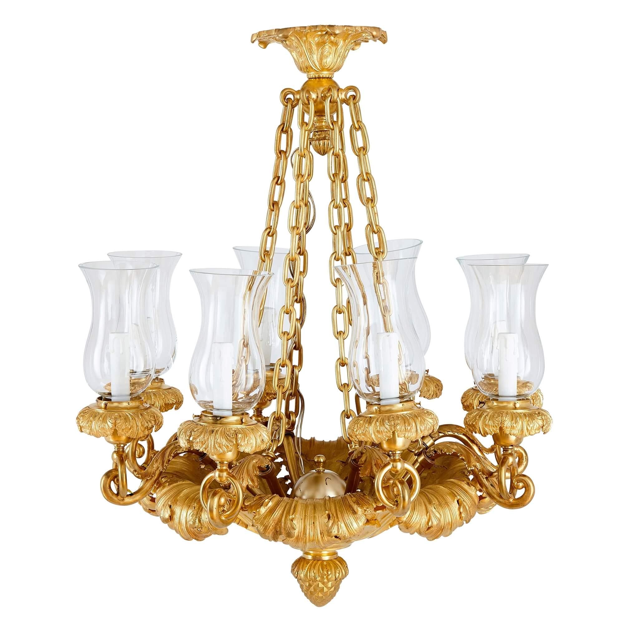 Antique French gilt bronze Louis Philippe chandelier
French, c. 1840
Measures: Height 86cm, diameter 73cm

This beautiful chandelier is designed in the ornate style that prevailed during the reign of Louis Philippe, King of the French, from 1830