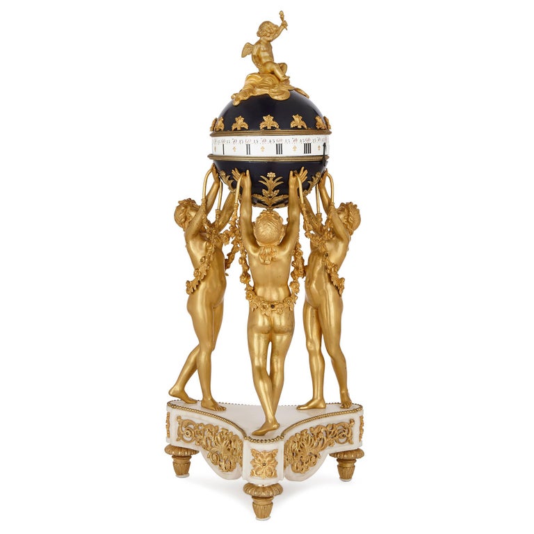 This exquisite mantel clock was designed in the 19th century in France, inspired by an earlier model by François Vion, a famous Parisian metalworker of the 18th century. In this design, as in Vion’s, the Three Graces are depicted holding up a