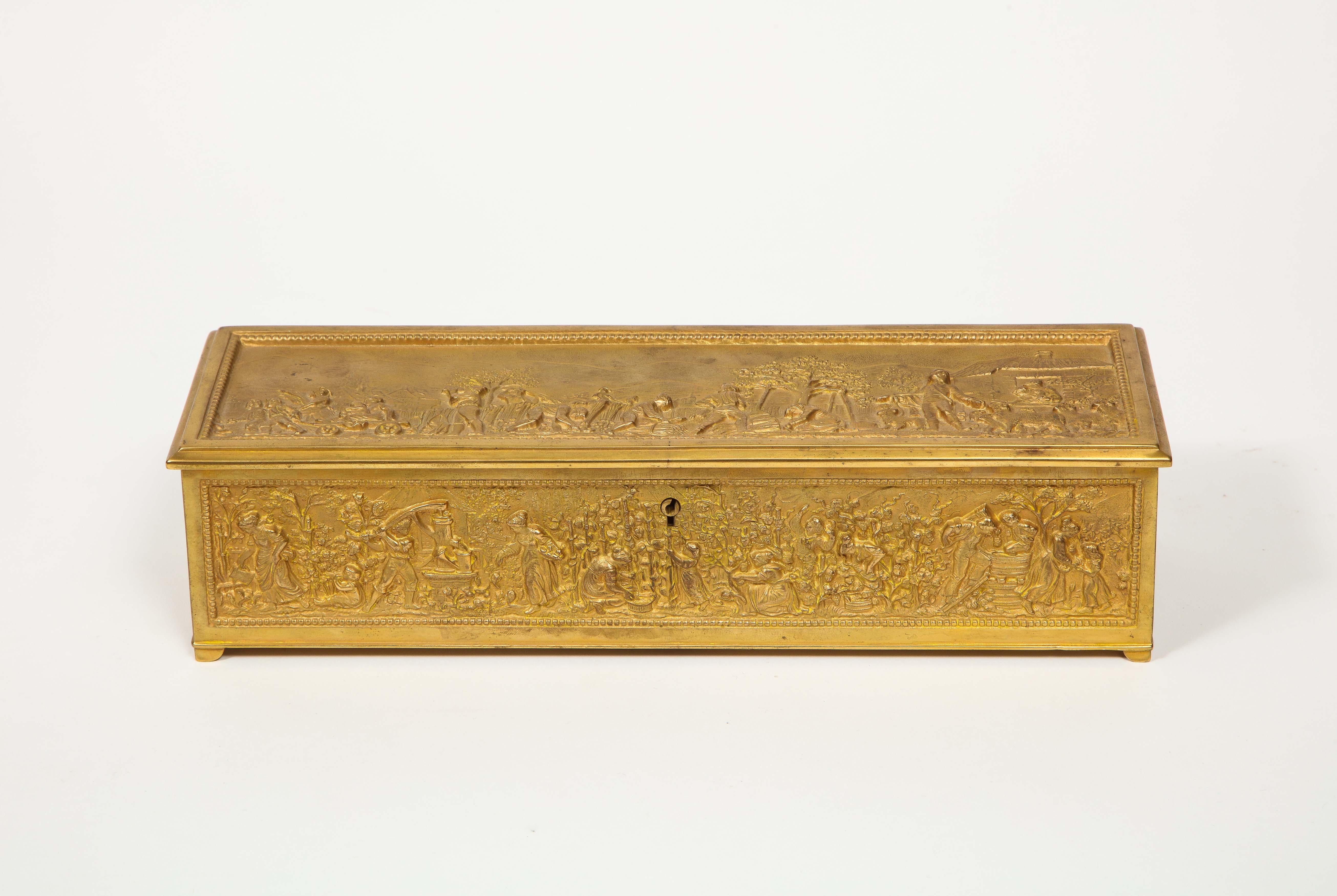 An antique French gilt bronze rectangular table box with red velvet lining, circa 1900.

Good quality, large size. 

Measures: 3