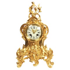 Horloge rocococo française ancienne en bronze doré