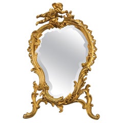 Antique Mirror da tavolo in stile rococò in bronzo dorato con cherubino e uccello
