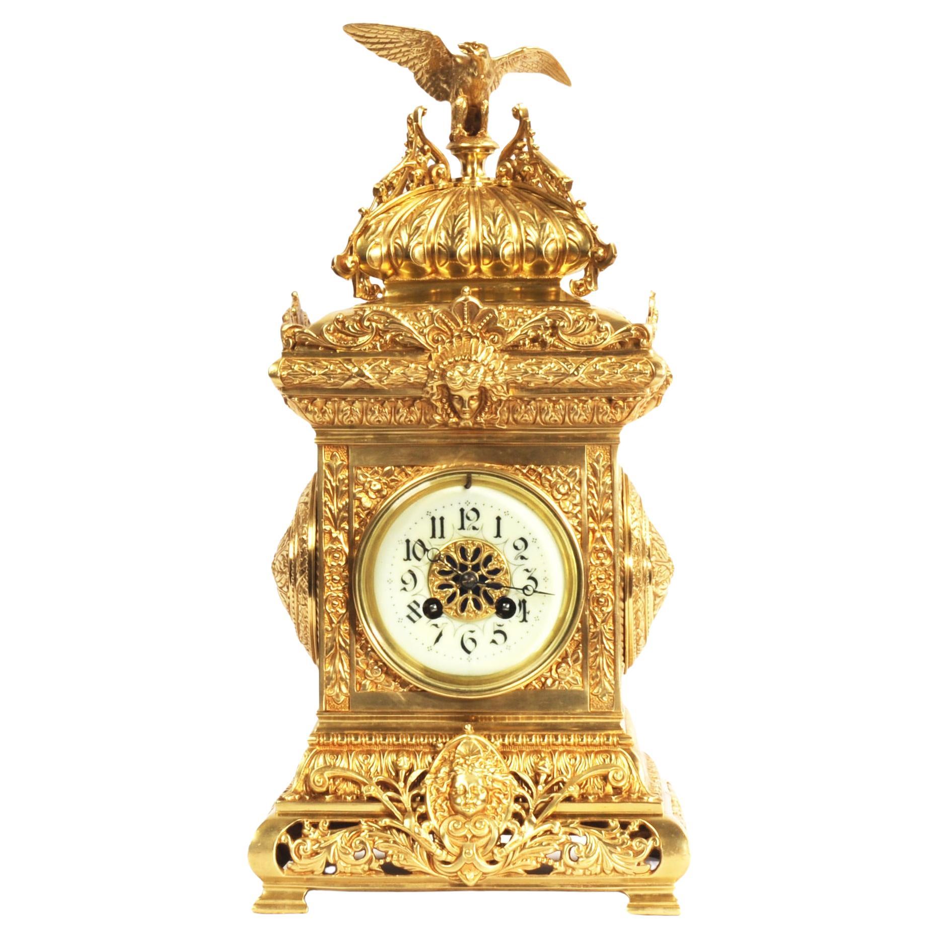 Reloj de sobremesa antiguo francés de bronce dorado - Águila en venta