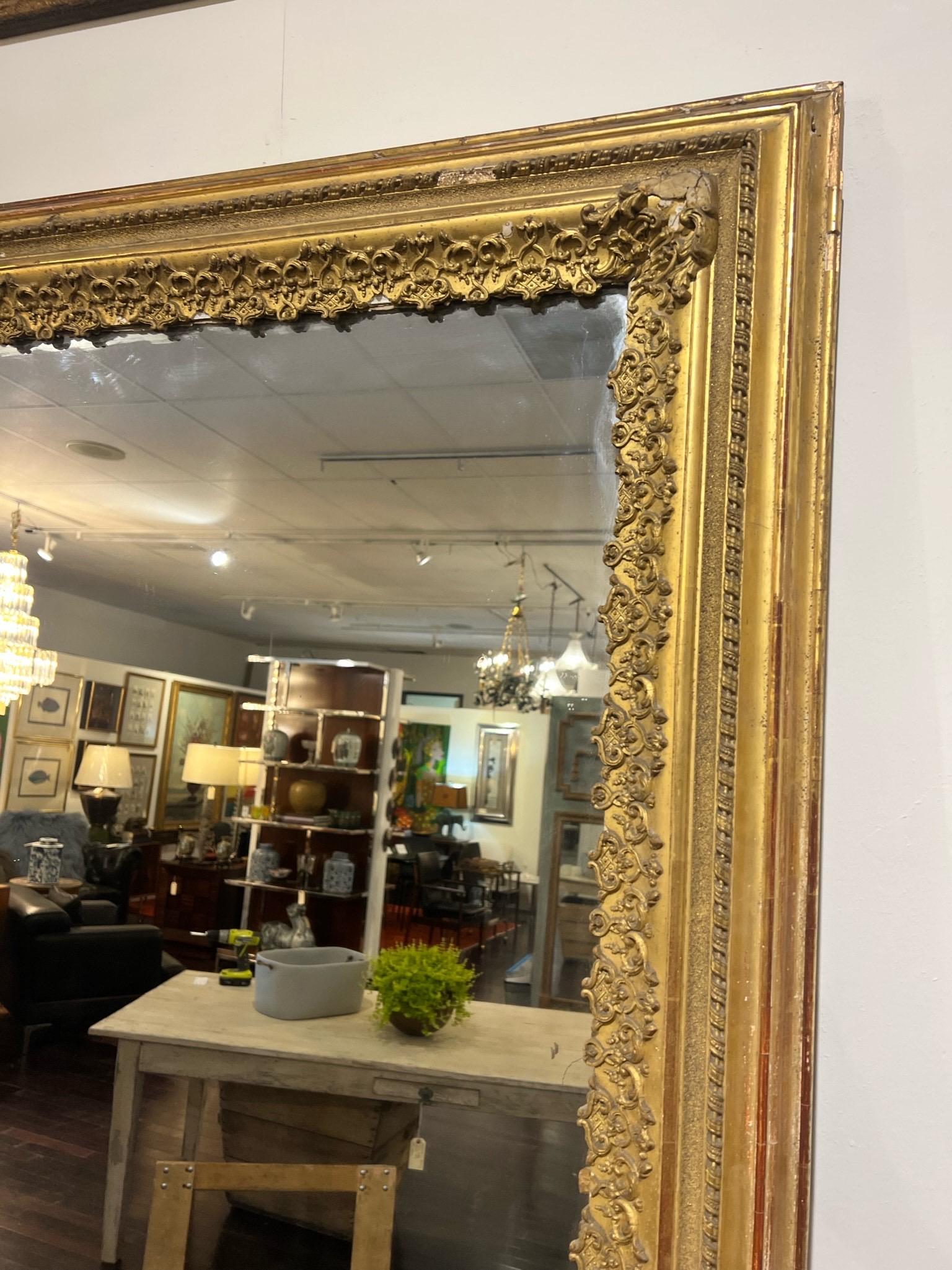 Carved Antique French Gilt Floor Mirror with Original Glass For Sale