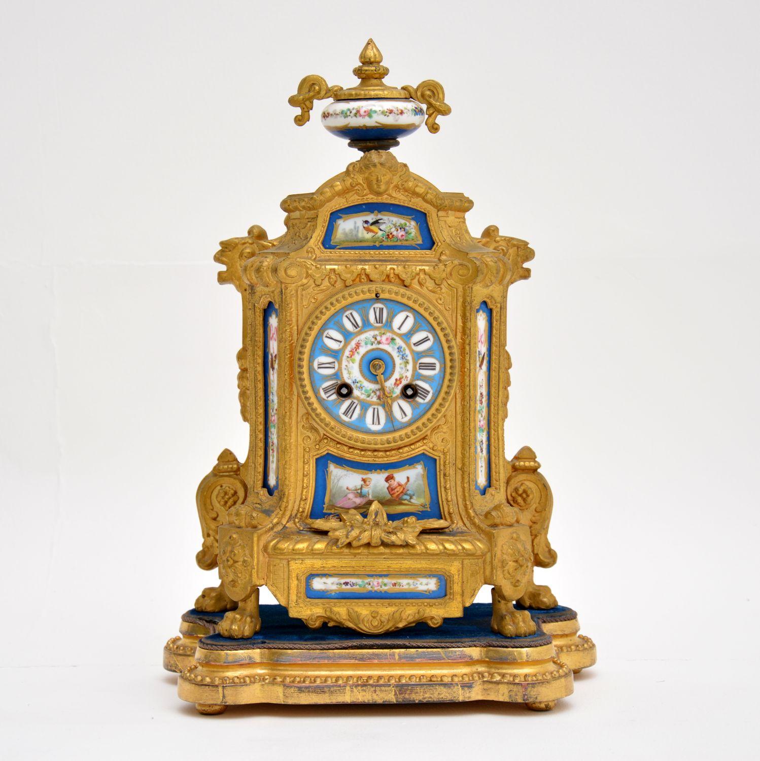 Antique French gilt metal clock with Sevres porcelain all in good condition and dating to circa 1880s period.

The porcelain is beautifully hand painted & the gilt metal case is well cast with many fine details. The makers name, Brunfaut is