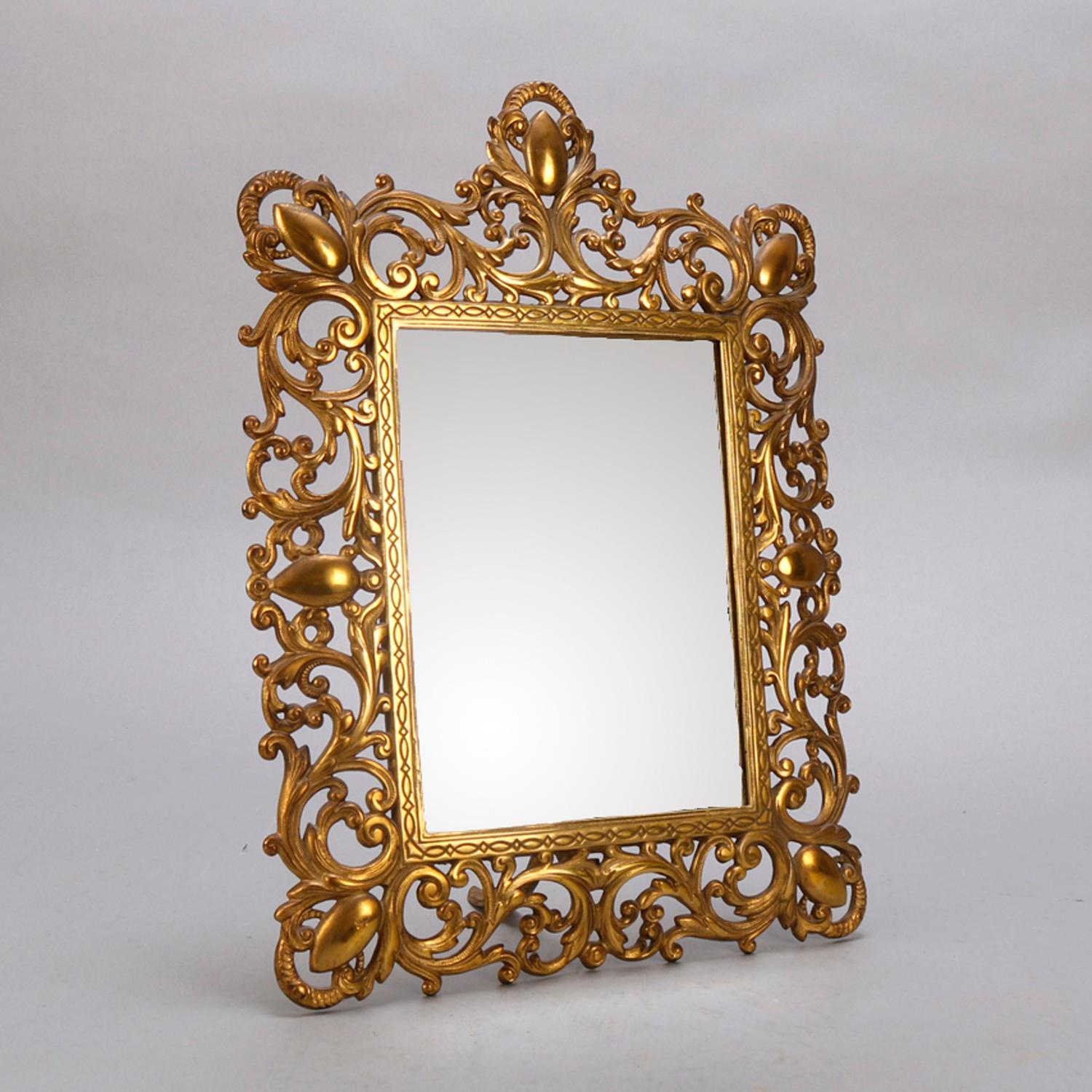 An antique French gilt metal tabletop vanity mirror offers pierced foliate form frame, circa 1900

***DELIVERY NOTICE – Due to COVID-19 we are employing NO-CONTACT PRACTICES in the transfer of purchased items.  Additionally, for those who prefer to