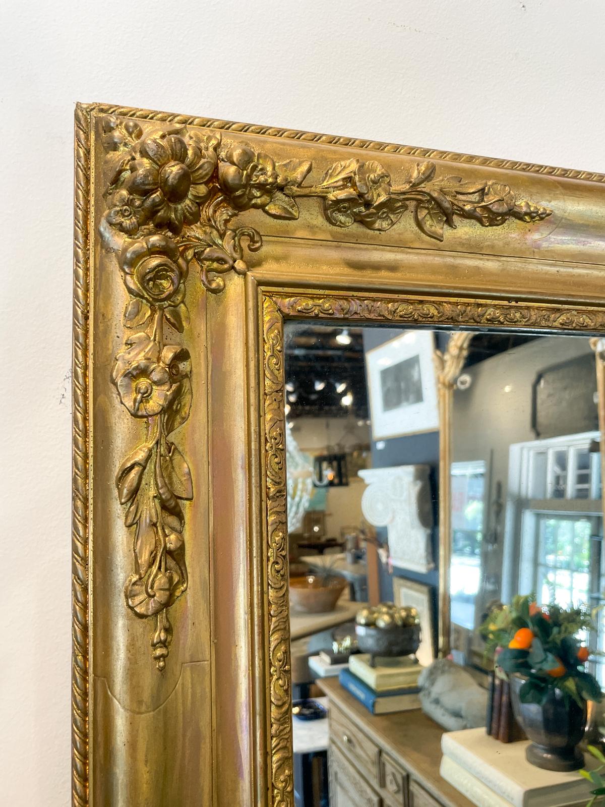 Baroque Antique French Gilt Mirror with Floral Detail For Sale