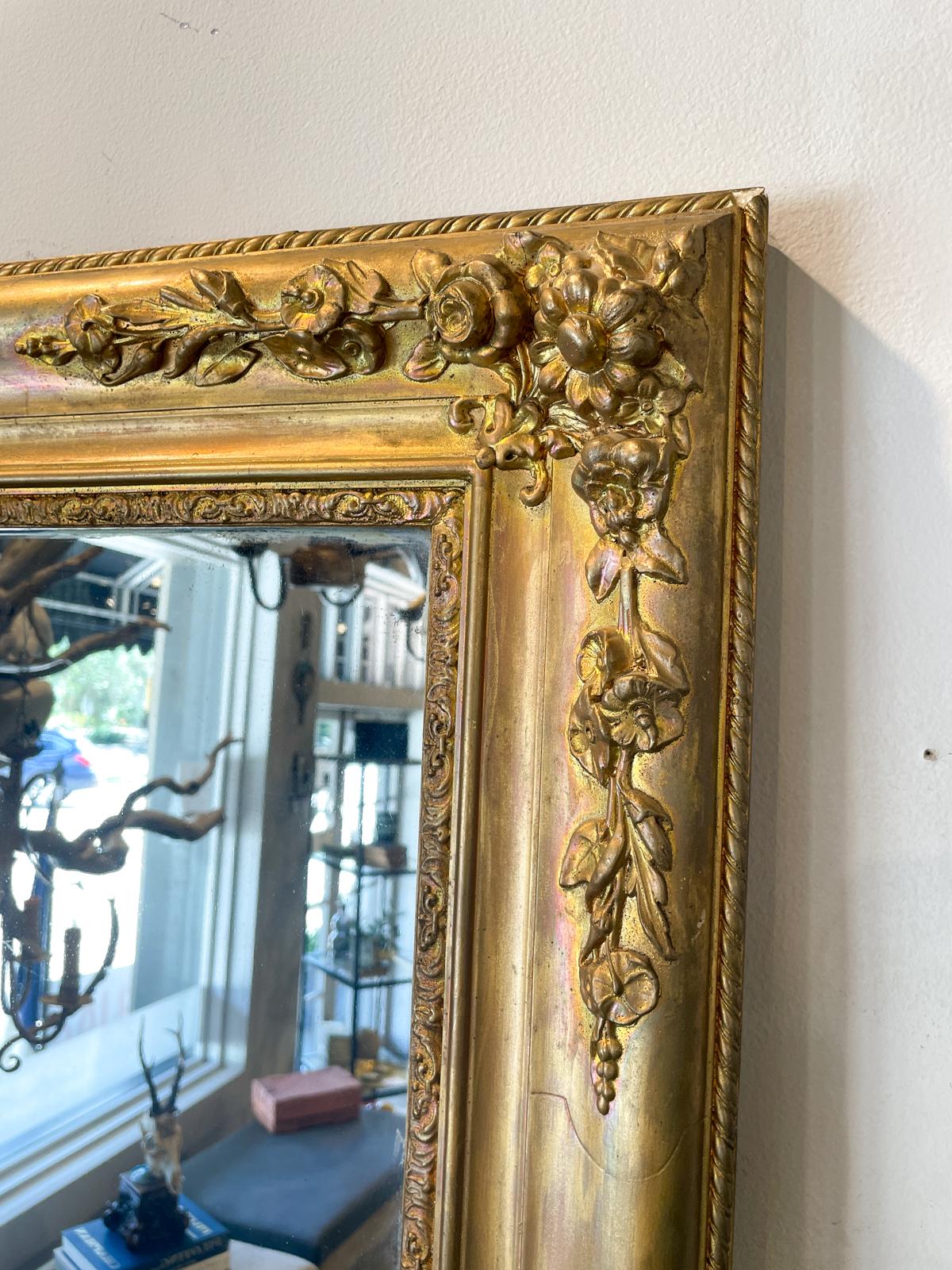 Antique French Gilt Mirror with Floral Detail In Good Condition For Sale In Houston, TX