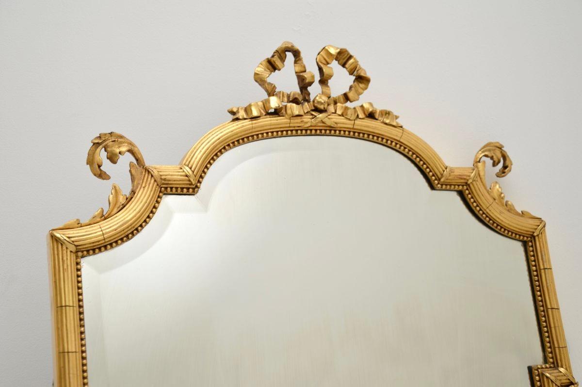 A stunning and extremely well made antique French gilt wood mirror, dating from around the 1880-1900 period.

The quality is outstanding, this is made from a mix of solid wood and gesso, with a gorgeous gilded finish around the bevelled glass