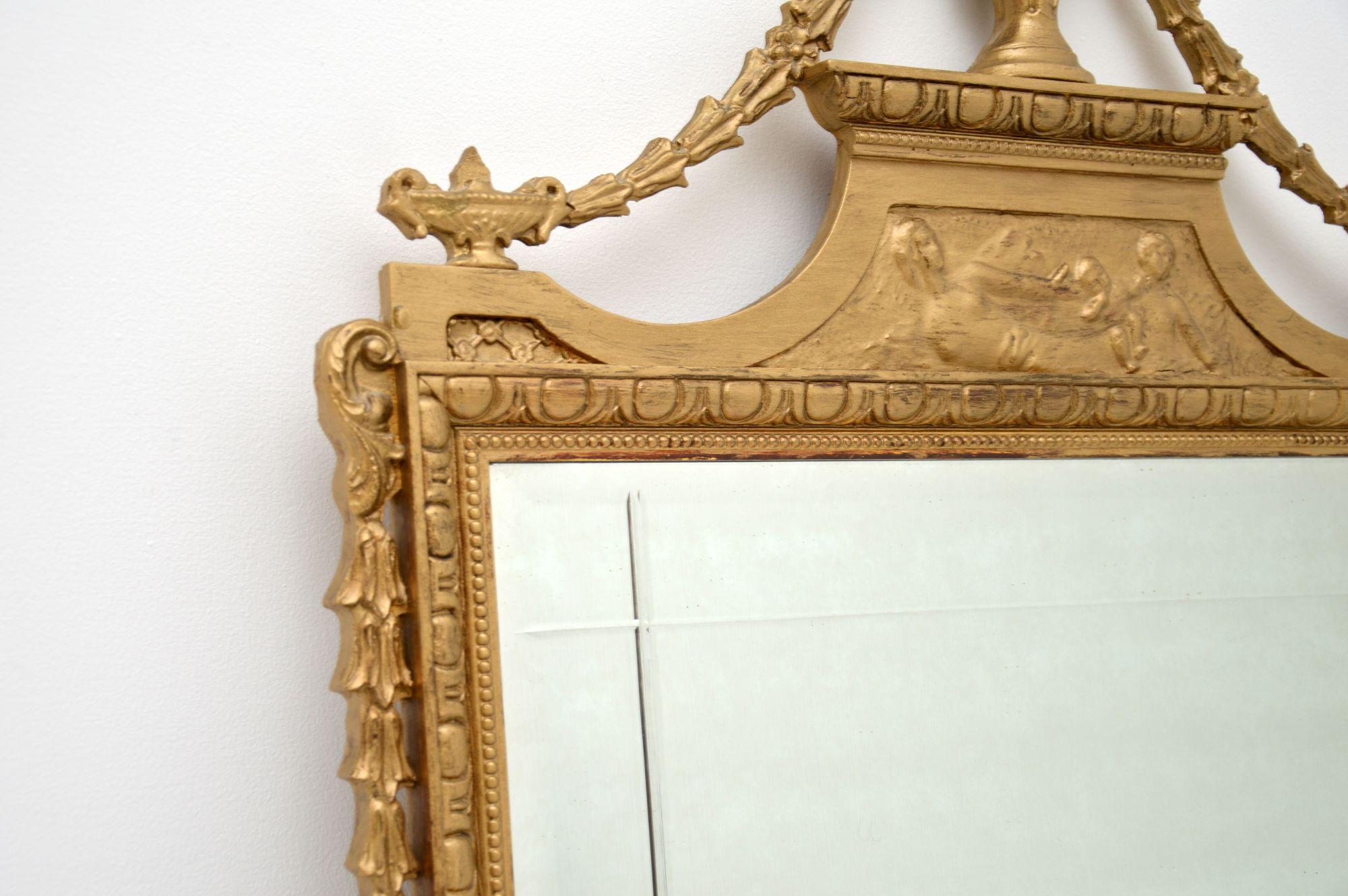 Milieu du XXe siècle Miroir ancien français en bois doré en vente