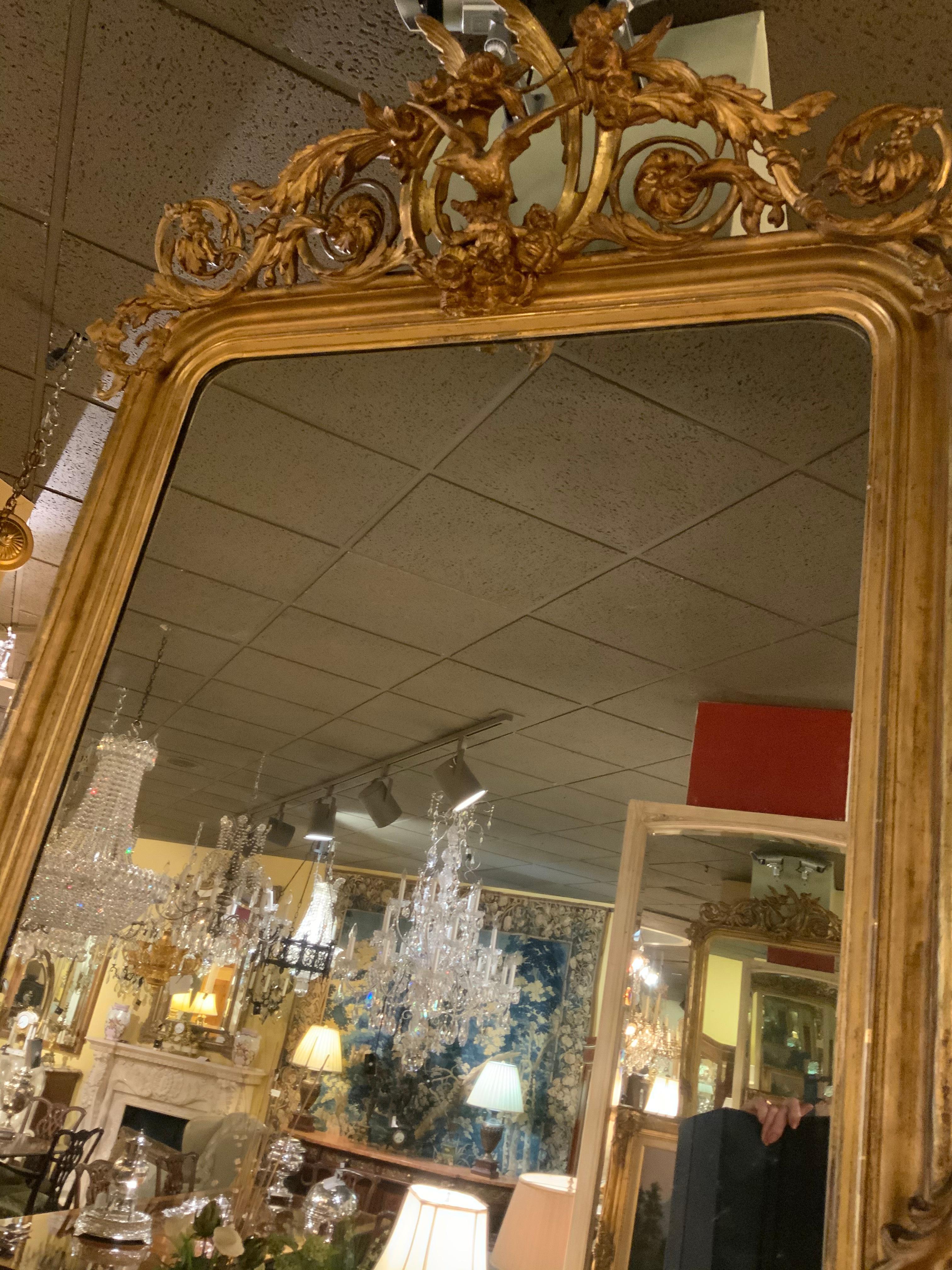 19th Century Antique French Giltwood Mirror with Carved Bird at the Crest, circa 1890