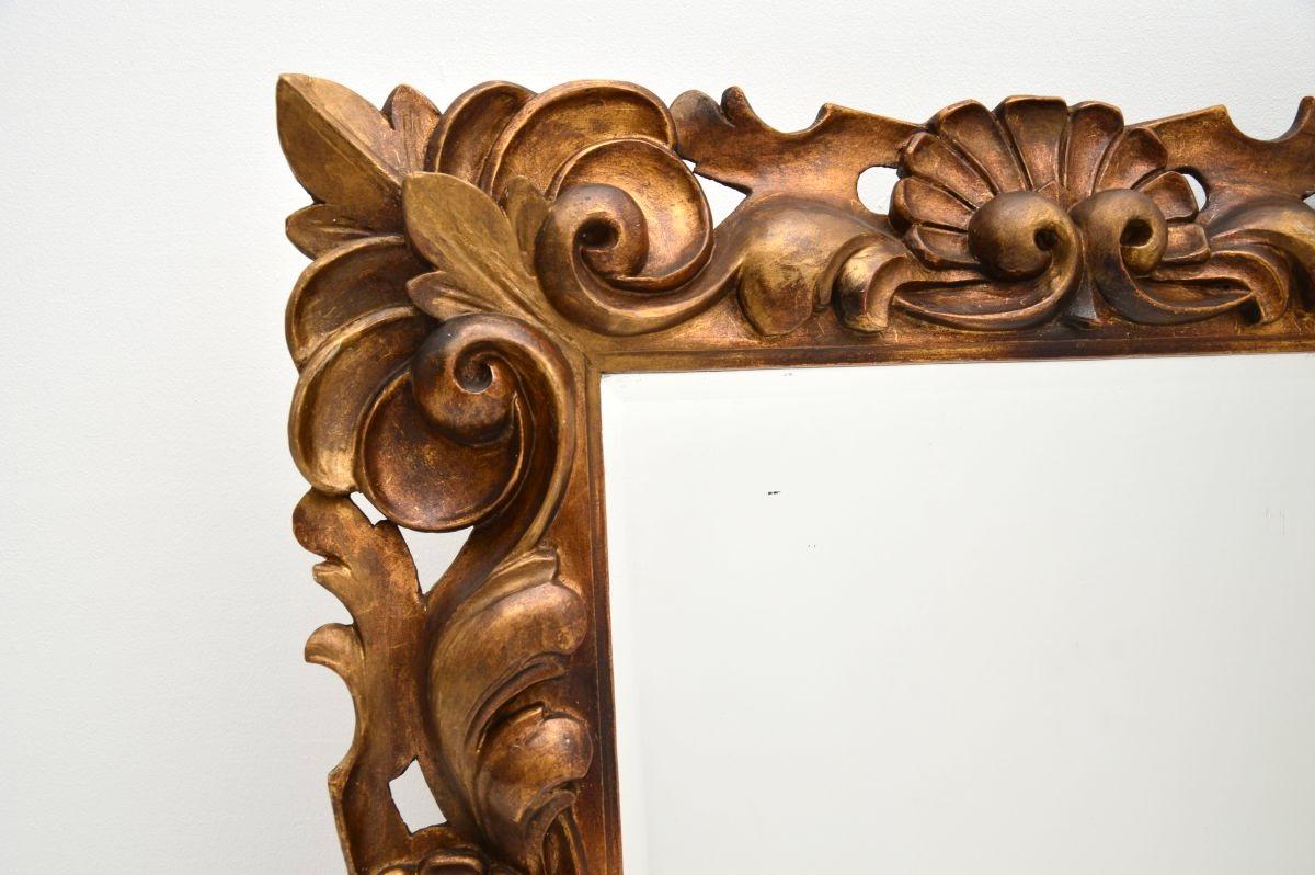 Early 20th Century Antique French Gilt Wood Rococo Style Mirror For Sale