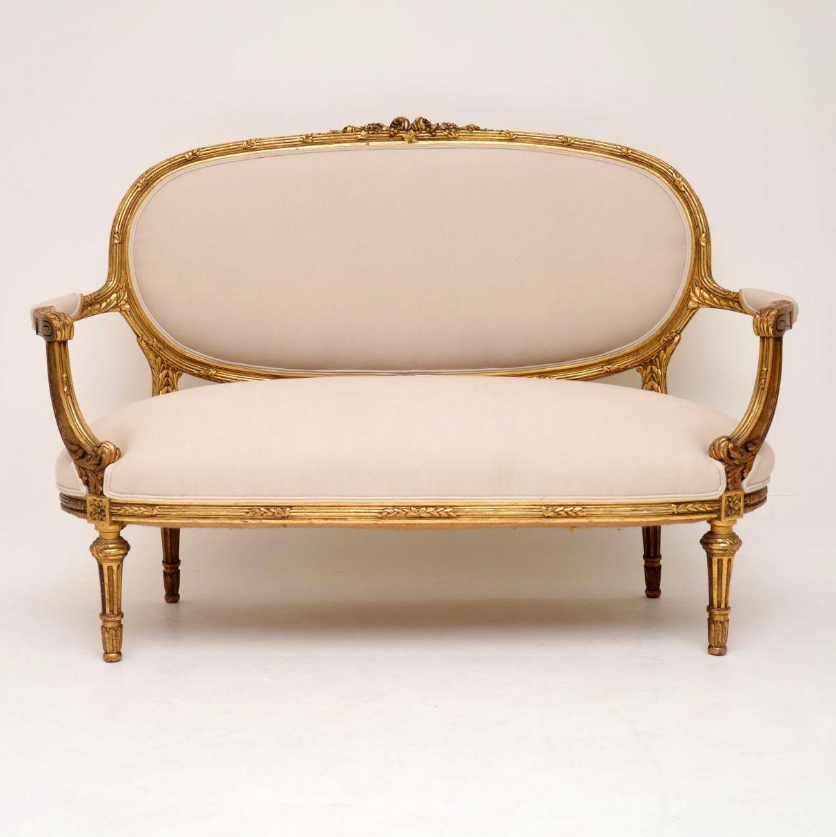 This antique French giltwood sofa is in very good condition and I would date it to circa 1850s period. The frame is beautifully hand carved all over and the gilding is original with some natural wear showing through in places. We didn’t want to mess