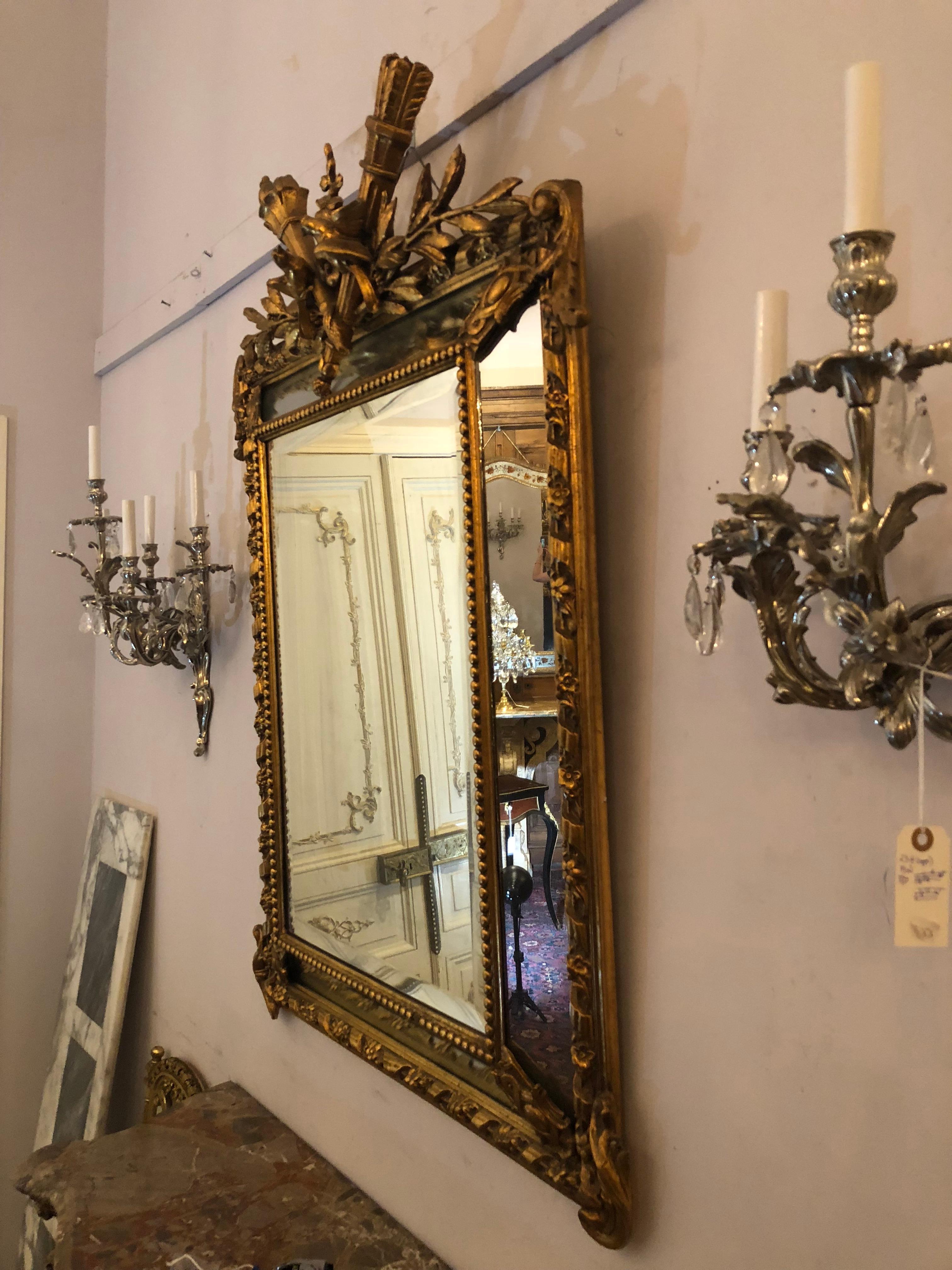 Antique French giltwood mirror, circa 1890-1910.