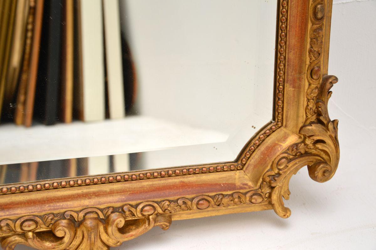 Miroir ancien en bois doré en vente 2