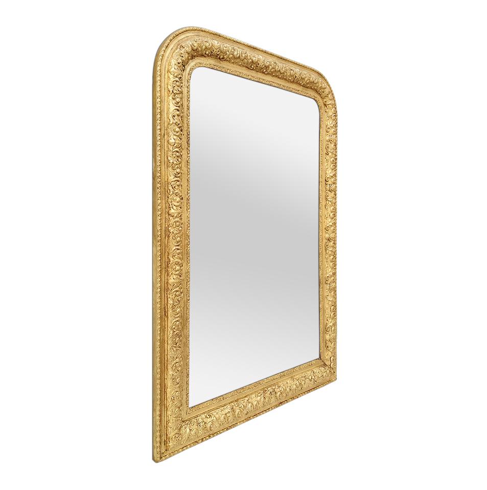 Antique giltwood mirror, Louis-Philippe French style, circa 1900. Antique frame mirror with foliage’s decor, re-gilding to the leaf patinated. Modern glass mirror. Antique frame width 9.5 cm / 3.74 in.