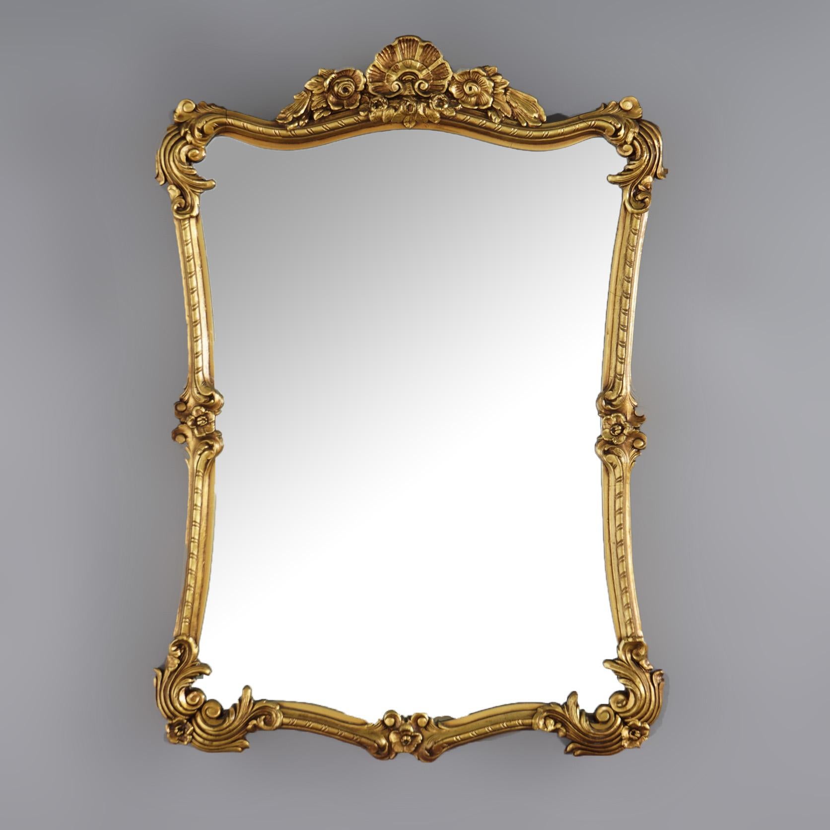 Antique French Giltwood Wall Mirror with Foliate Elements & Gadroon Crest, Circa 1930

Measures- 36''H x 25''W x 3''D; 30.5'' x 19.5'' sight