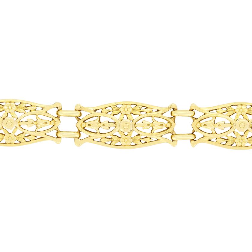 Hailing from France this antique bracelet was crafted in the 1900s. Each section of this stunning 18 carat yellow gold bracelet is decoratively patterned with a floral design with a box clasp holding the piece firmly on the wrist. This wonderful