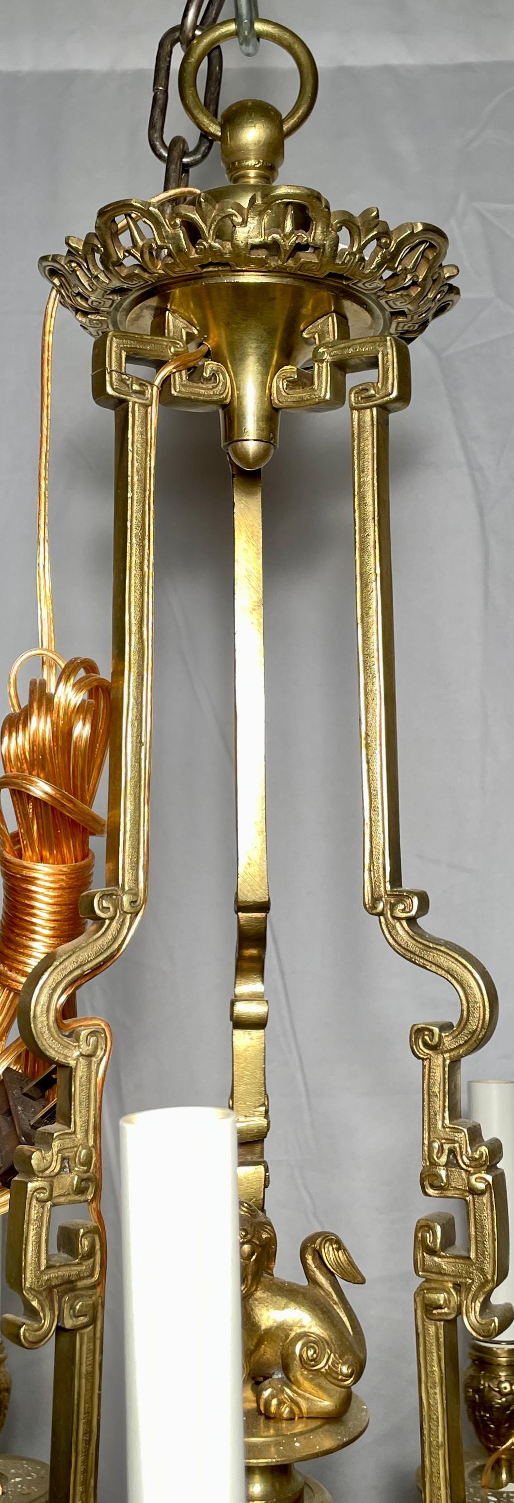 Antique French gold bronze 10 light chandelier with Greek Key Design, Circa 1890.
