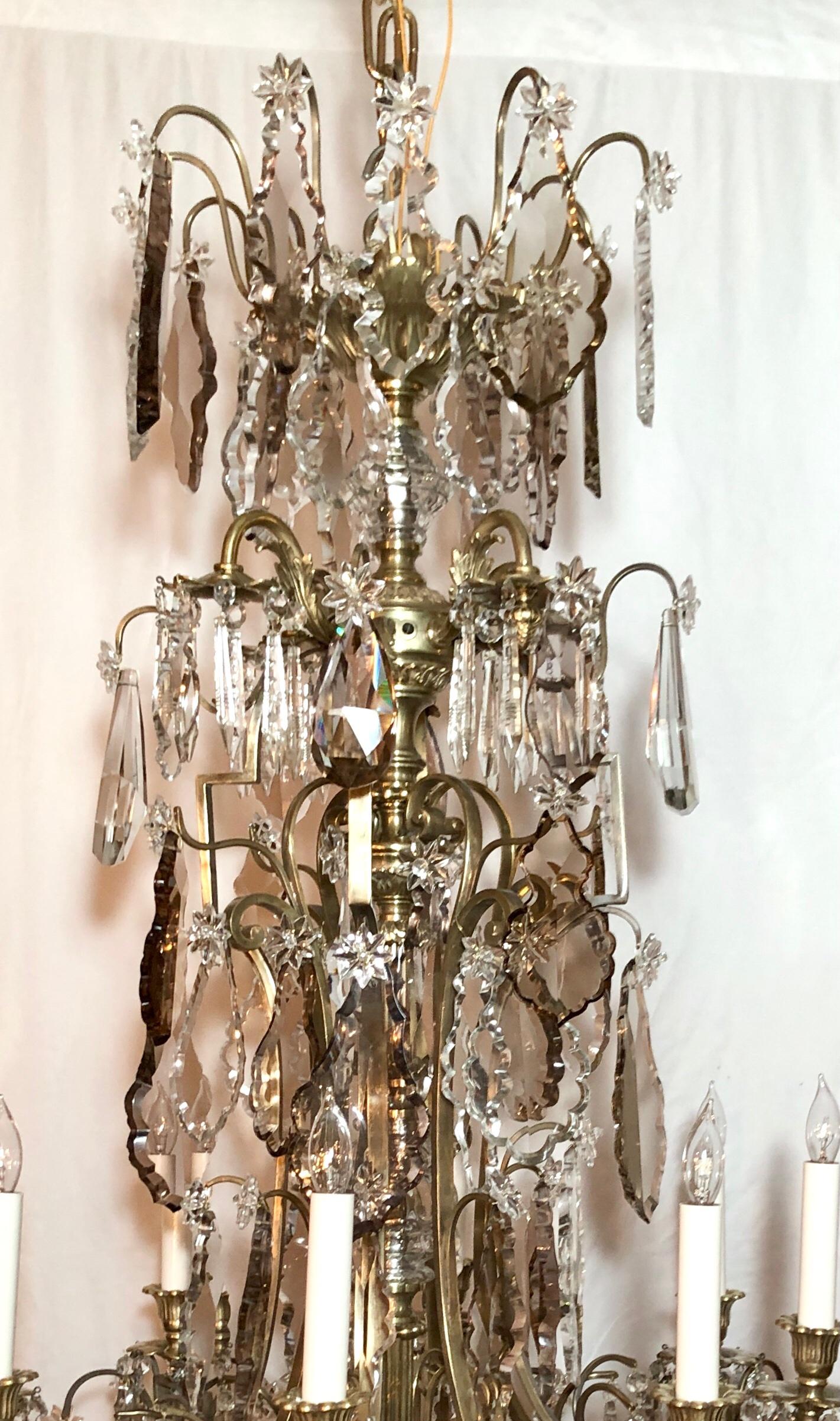 Antique french gold bronze and all original Baccarat crystal richly draped chandelier, Circa 1865-1875.