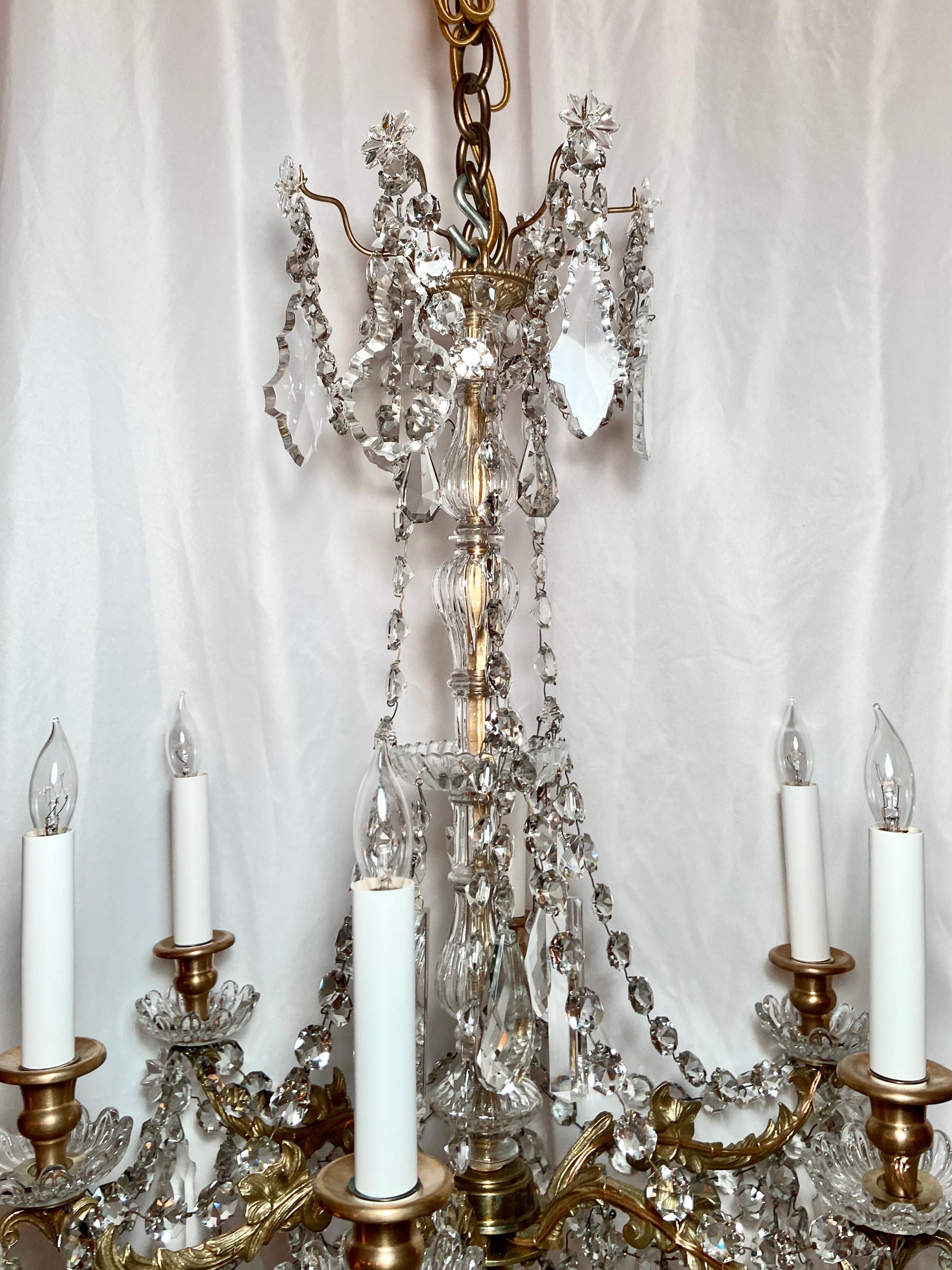 Antique French gold bronze and Baccarat crystal six light chandelier, Circa 1890.