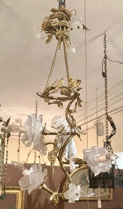 Antique French Gold Bronze and Bisque Porcelain Cherub Chandelier, Circa 1895.