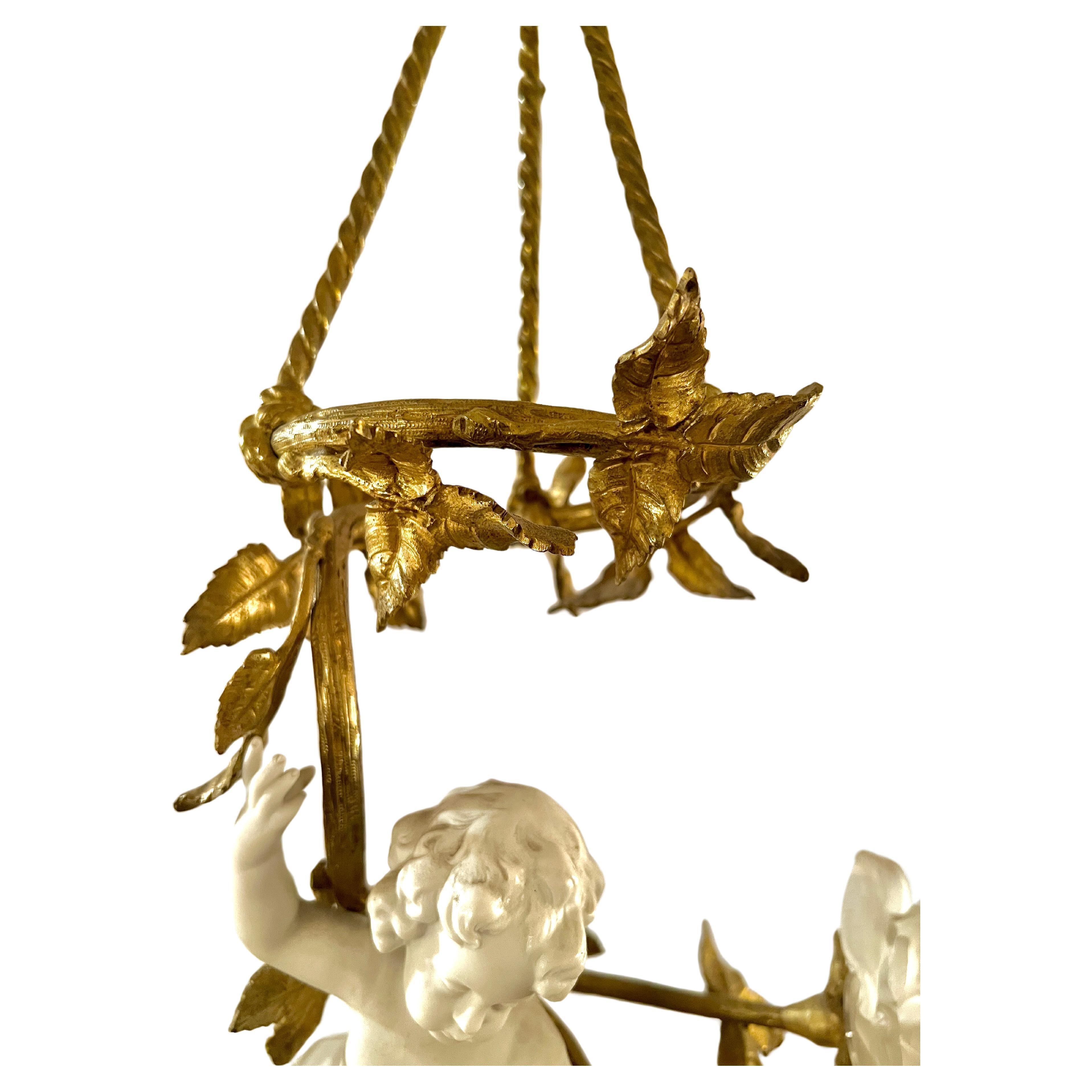 Antique French Gold Bronze and Bisque Porcelain Cherub Chandelier, Circa 1895. In Good Condition For Sale In New Orleans, LA