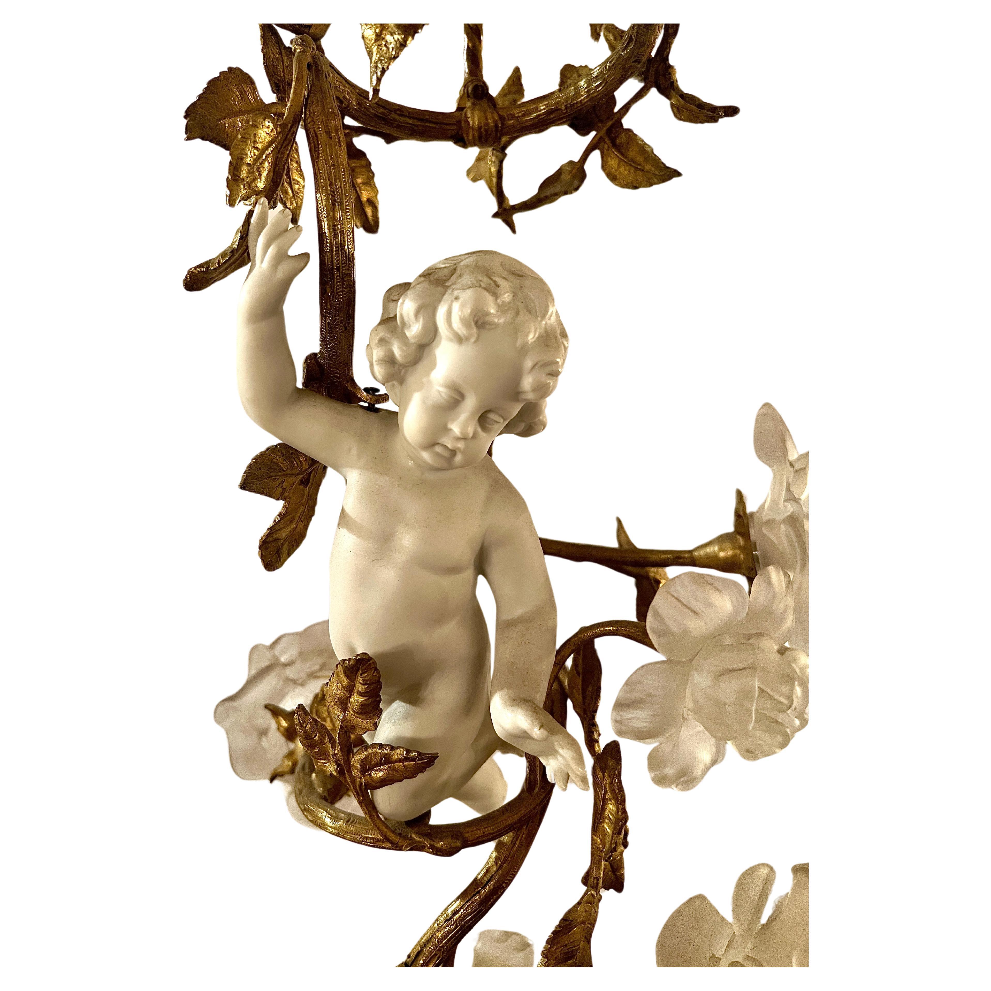19th Century Antique French Gold Bronze and Bisque Porcelain Cherub Chandelier, Circa 1895. For Sale