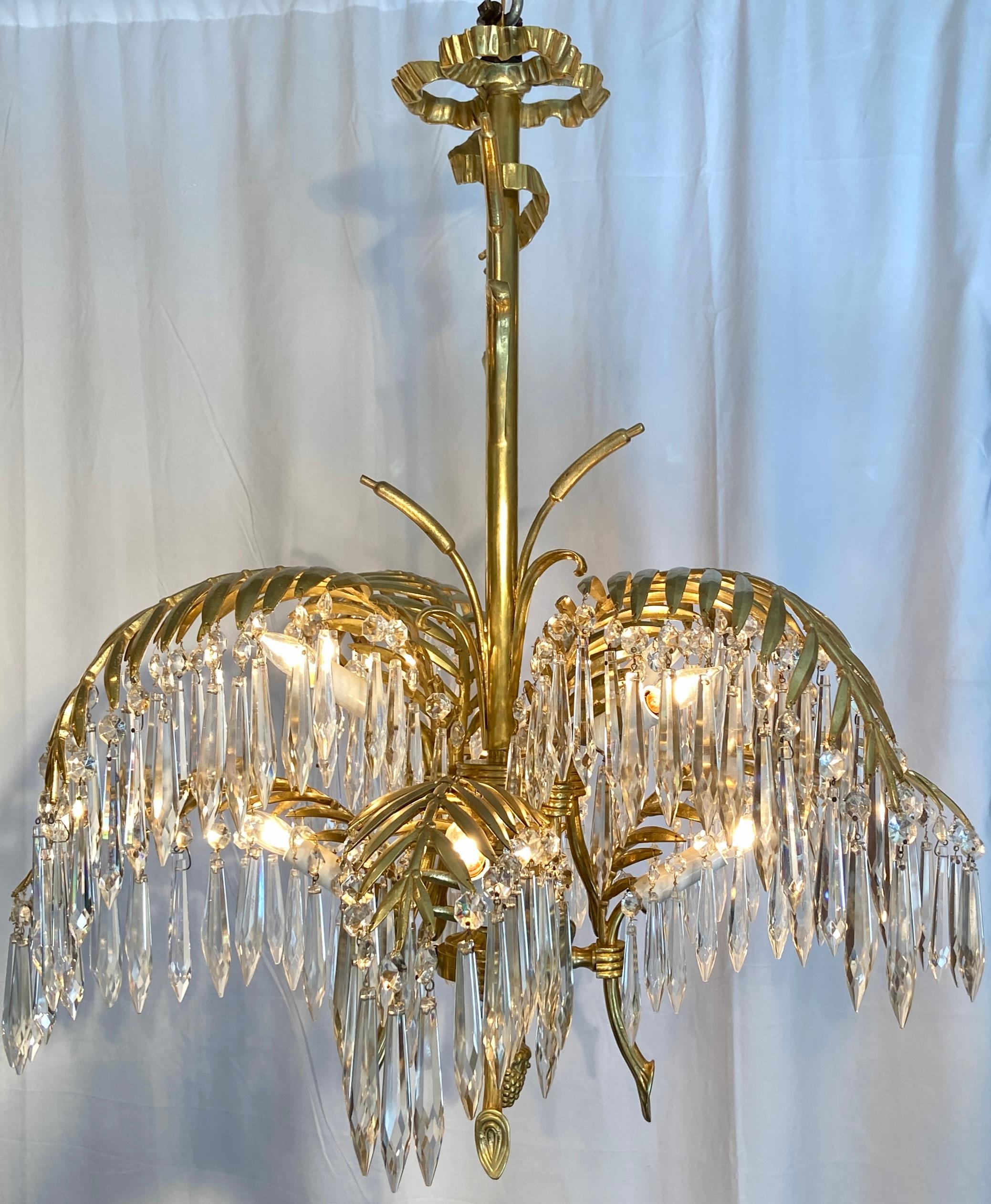 Antique French gold bronze and cut crystal palm chandelier, circa 1890.