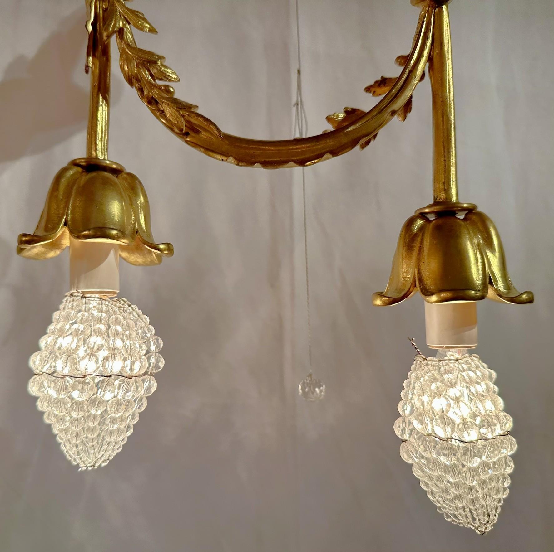 Bronzo Antico lampadario francese in bronzo dorato e bronzo patinato 