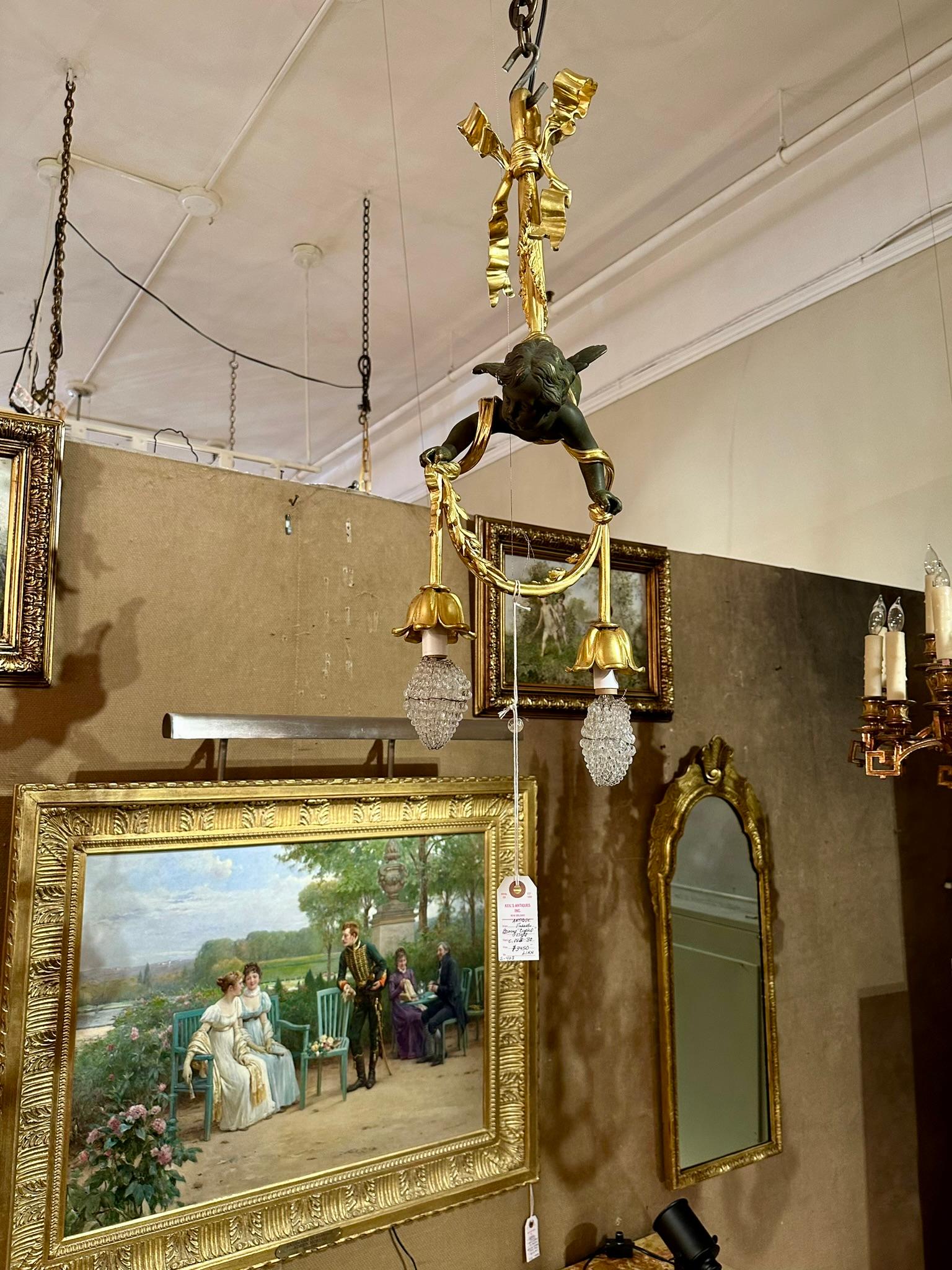 Antico lampadario francese in bronzo dorato e bronzo patinato 