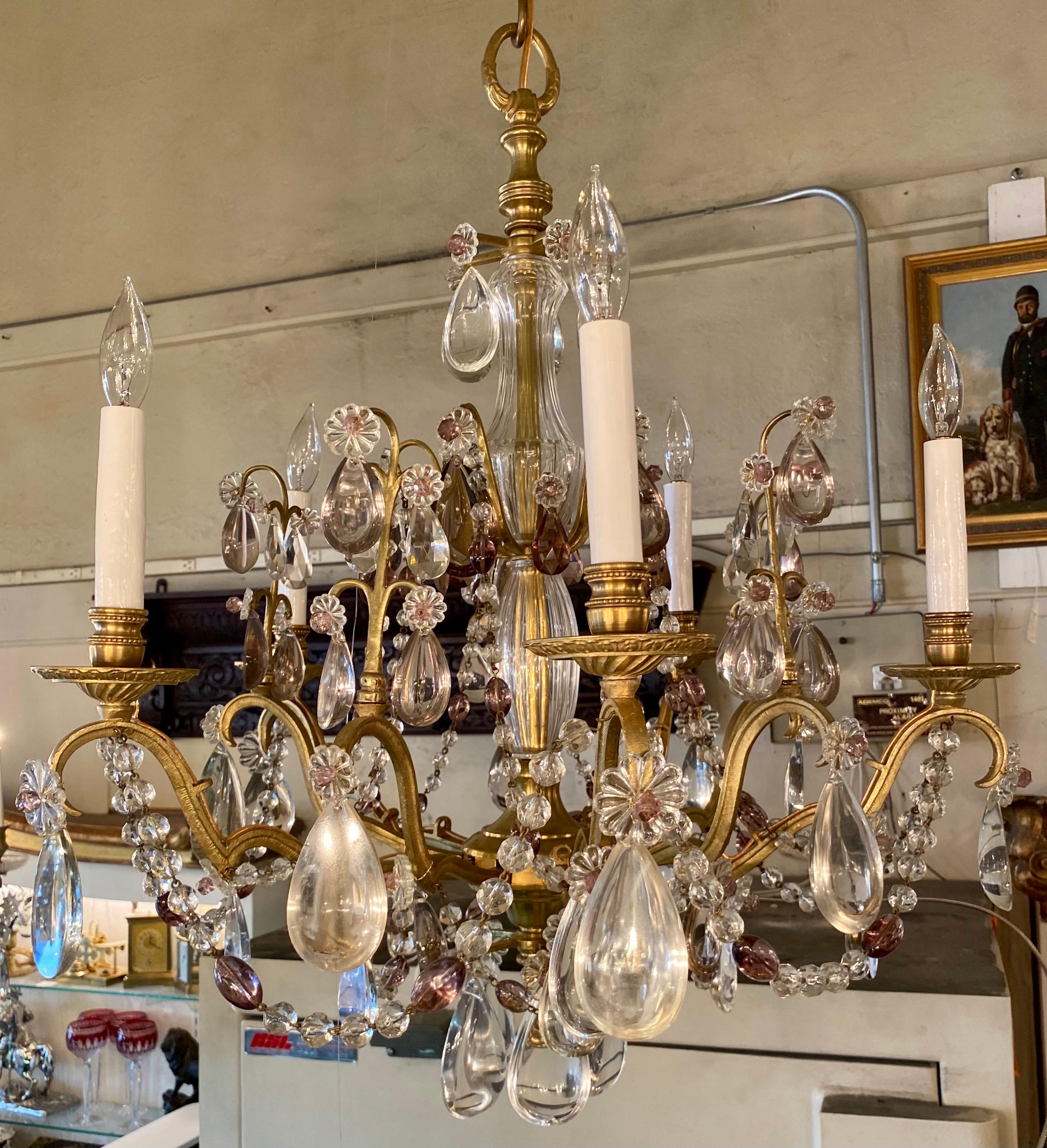 Antique French gold bronze & clear and amethyst baccarat crystal chandelier, Circa 1890.
This is a nice shape chandelier for lower ceilings and small spaces.