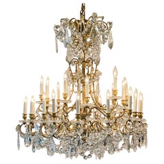 Lustre français ancien 30 feux en bronze doré et cristal taillé Baccarat, vers 1910