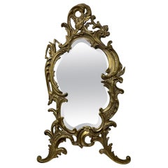 Antique Mirror francese da tavolo con cornice in bronzo dorato e smussatura a curva, circa 1880.
