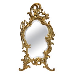 Antiguo espejo de tocador francés de bronce dorado con bisel, hacia 1880