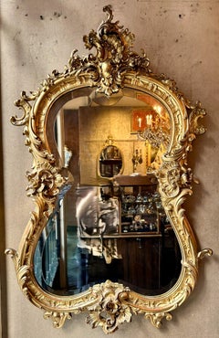 Antique French Gold Carved Wood Mirror with Beveled Glass, Circa 1865-1885.