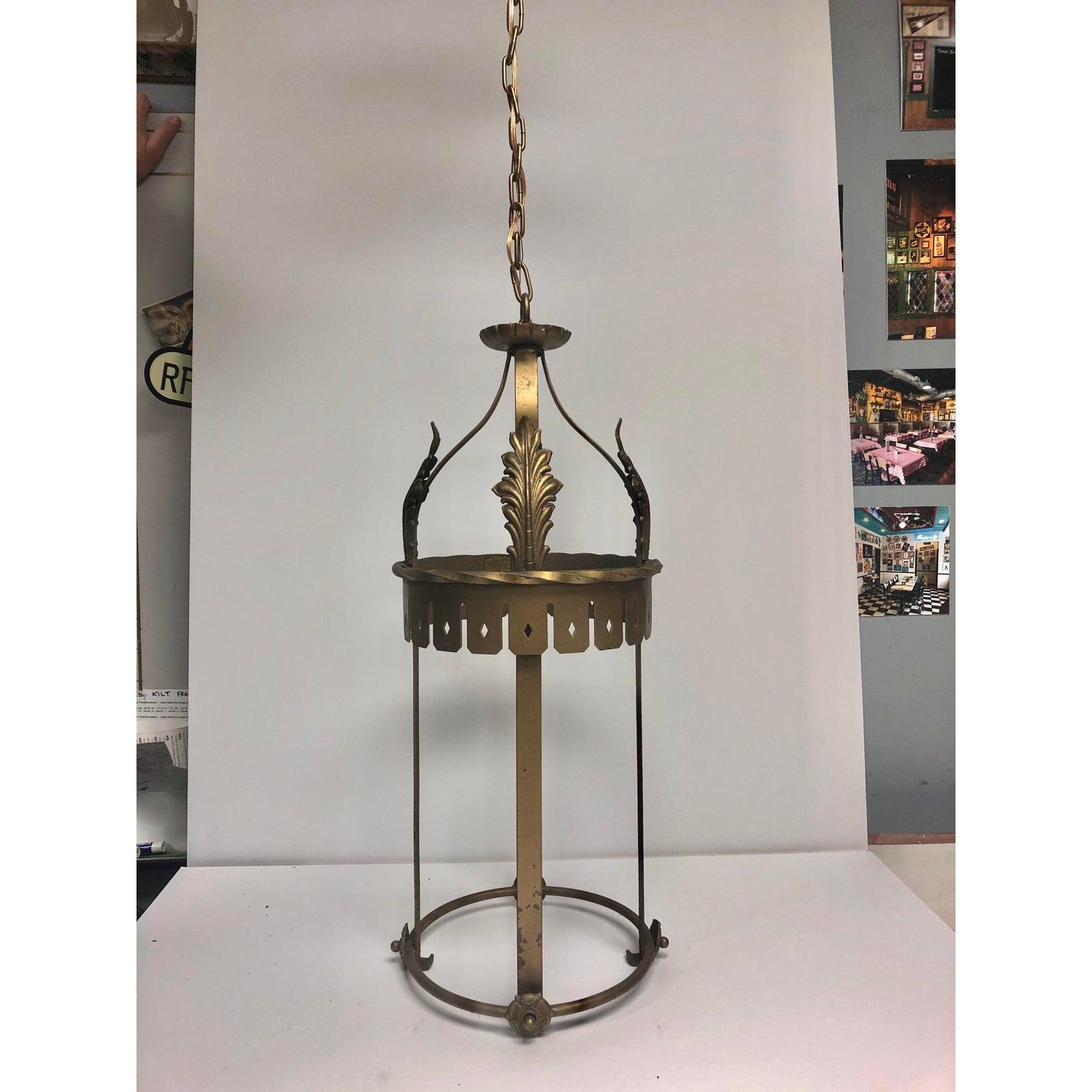 Antique French decorative lantern. Fixture H 30.5”, chain 33”. Recently rewired. It holds one bulb.